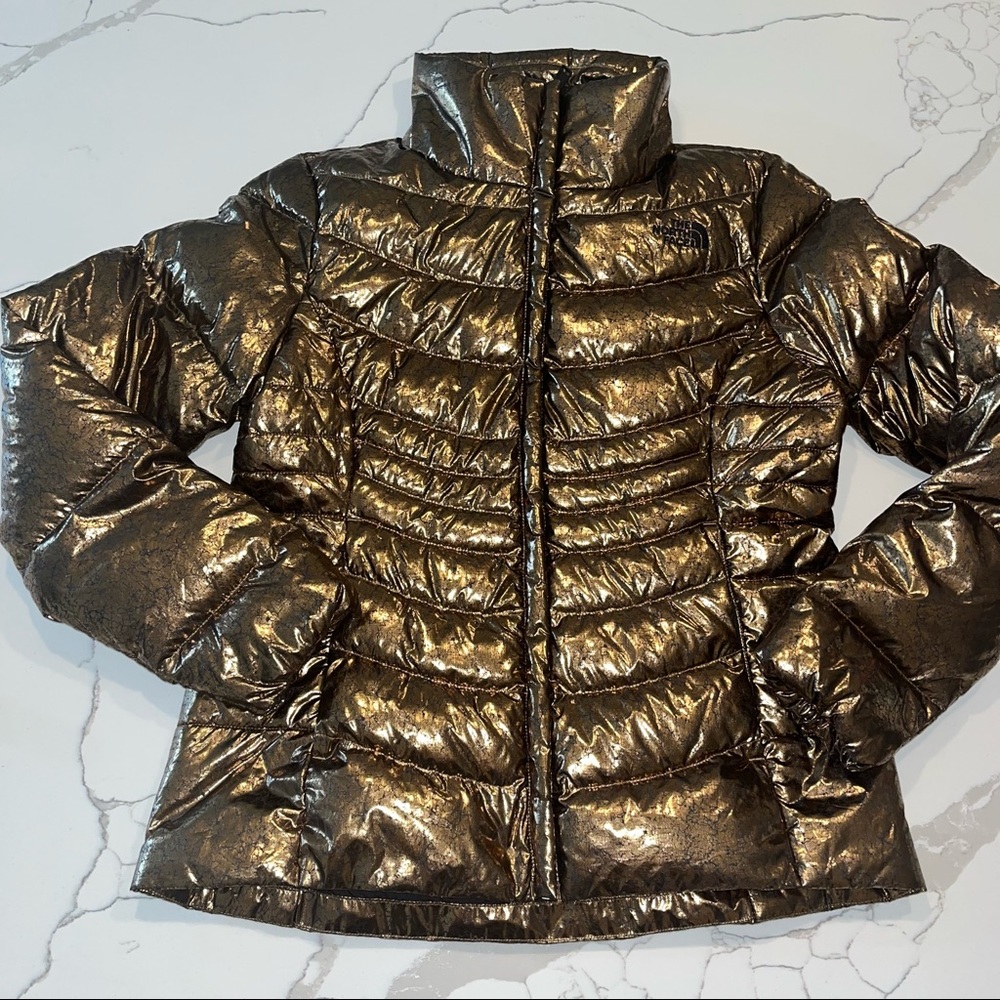 North Face Women’s med metallic gold down jacket Aconcagua2 Excellent condition.